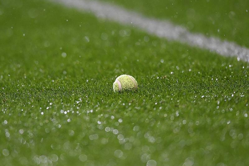 A tennis ball thrown onto the pitch as the rain and sleet falls down  during the Sky Bet Championship match between Bolton Wanderers and West 
Bromwich Albion at University of Bolton Stadium on January 21, 2019 in 
Bolton, England.