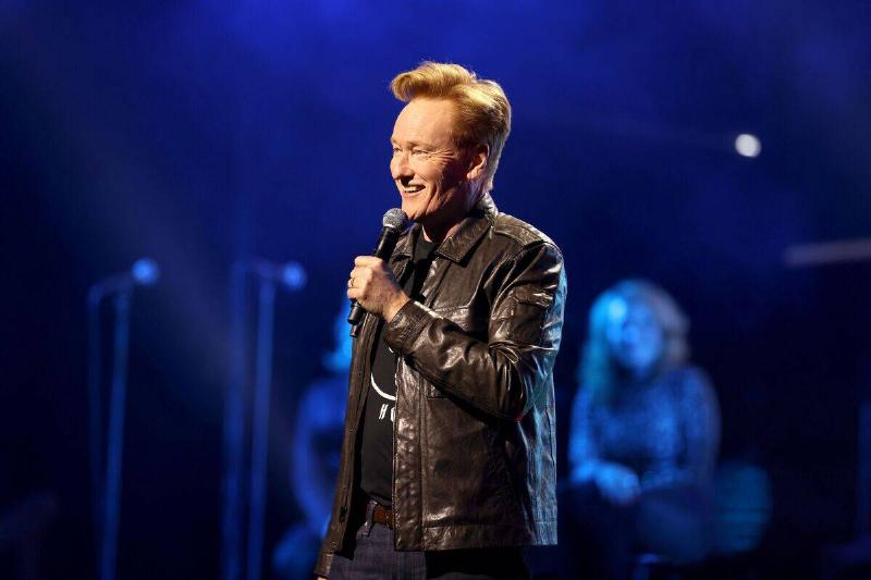 Conan O'Brien standing on stage