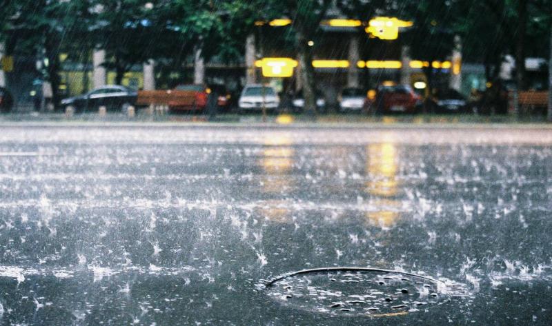 A street being rained on.