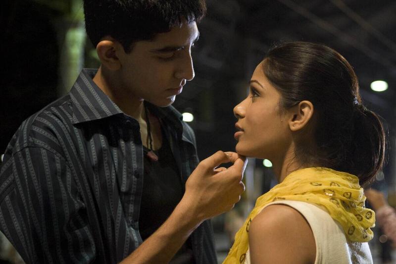 Dev Patel and Freida Pinto as Jamal and Latika in 'Slumdog Millionaire'