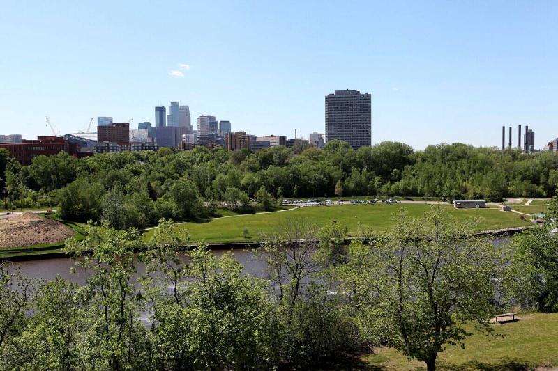 Partial view of the Minneapolis skyline as photographed from the University of Minnesota campus on May 21, 2015 in Minneapolis, Minnesota.