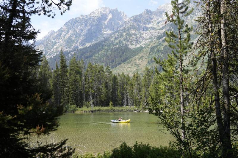 People float down String Lake on August 8, 2024 in Grand Teton National Park, Wyoming.