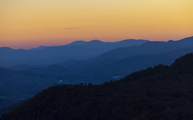 A sunset viewed from the Blue Ridge Parkway located in the Blue Ridge Mountains near Asheville North Carolina on Wednesday, October 25, 2023.