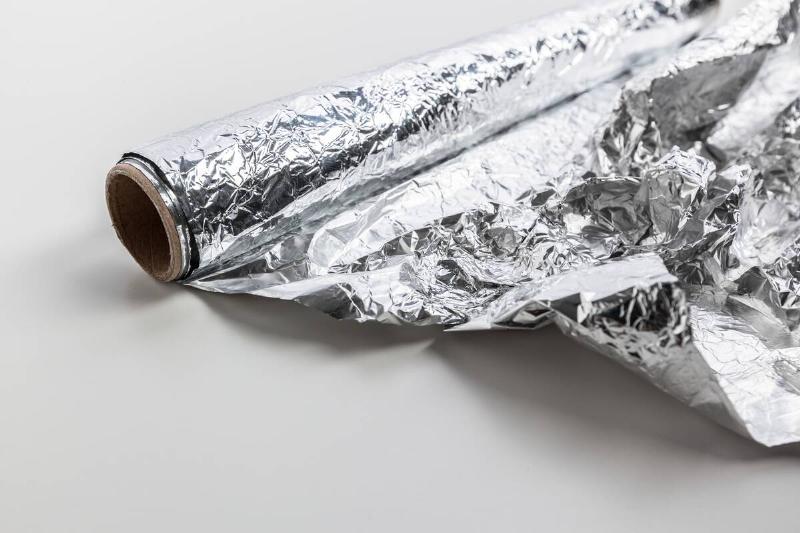 A roll of aluminum foil. 