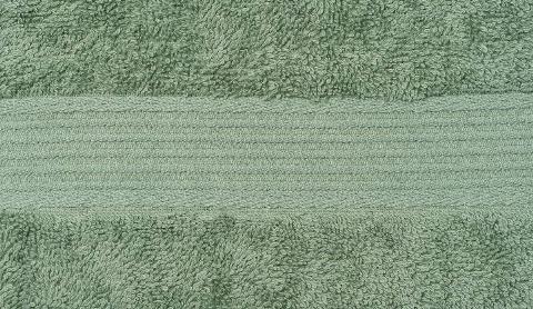 Dobby border on a green towel. 