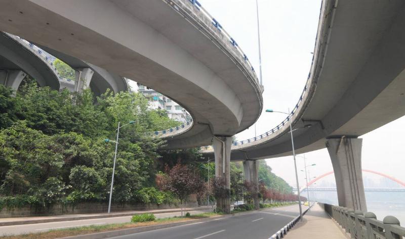A city road under an overpass.