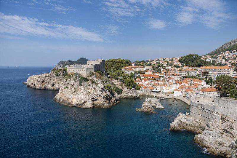 view of Fort Lovrijenac which sits above Blackwater Bay from old town of Dubrovnik.
