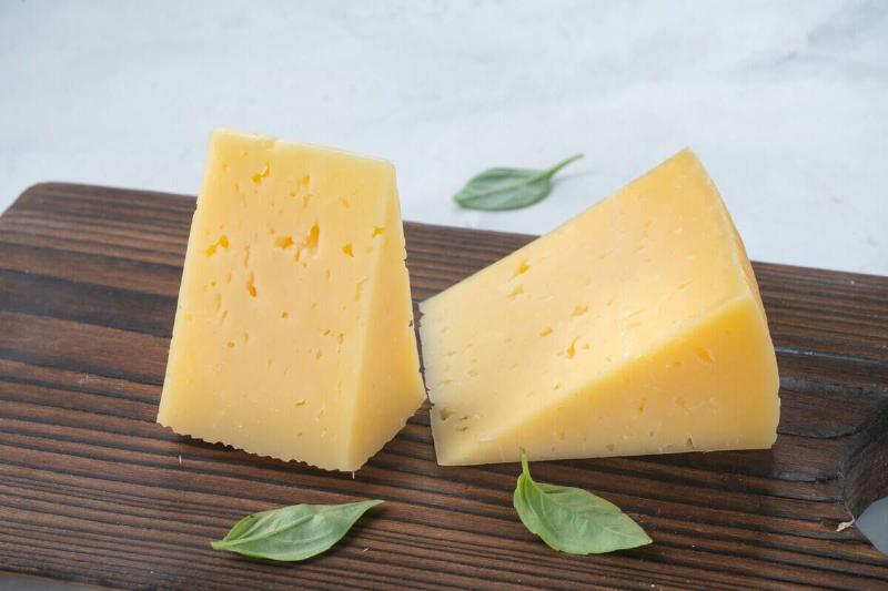 Cheese on a wooden cutting board
