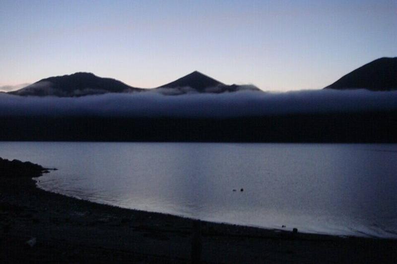 Fog moving in on Afognak Island, Alaska at midnight in July 2009.