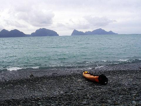 A kayak on North Beach, Caines Head.