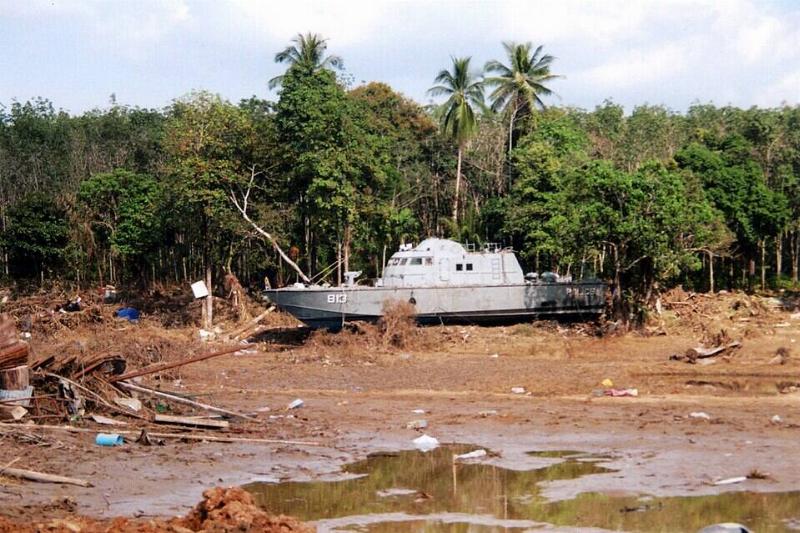 A police boat beached by a tsunami in Thailand. 