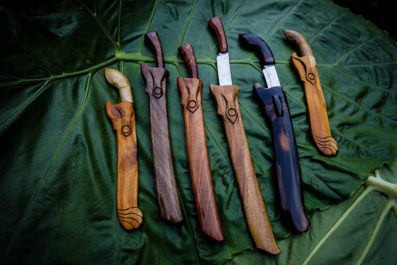 Parangs in wooden sheaths. 