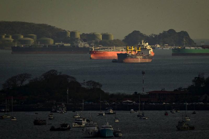 Cargo ships wait to transit the Panama Canal on the Pacific side.