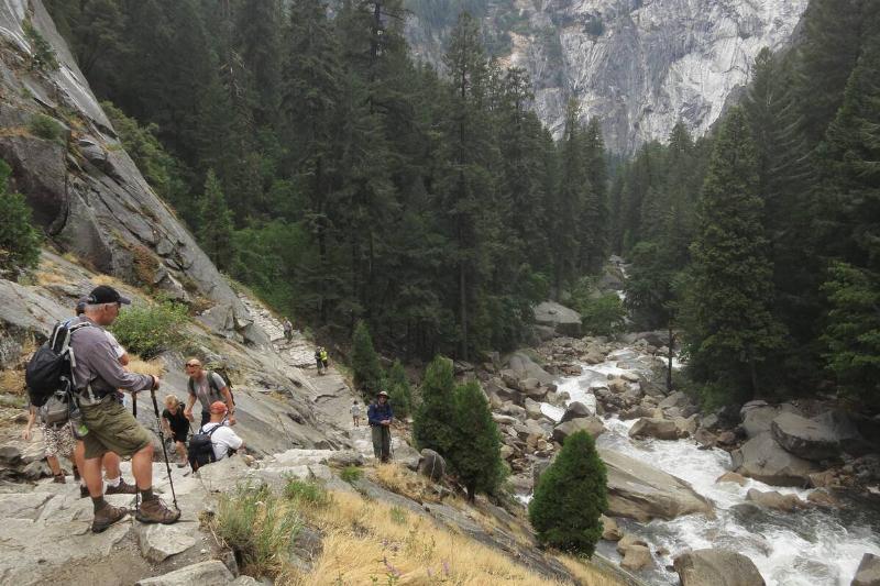 Visitors hike the Vernal Fall trail on July 21, 2014 in Yosemite National Park, California.