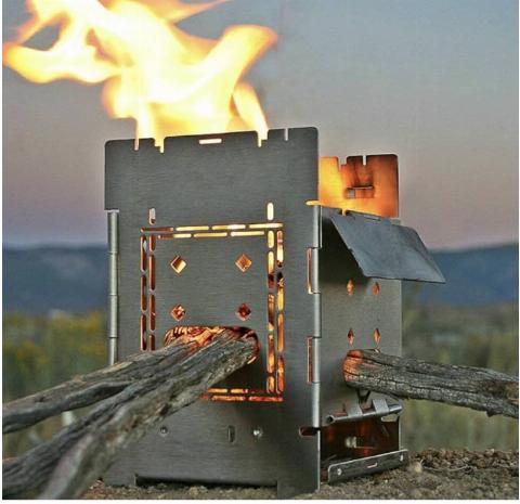 The Firebox Bushcraft Camp stove burning wood. 
