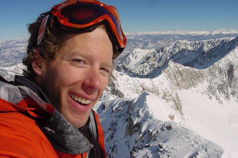 Aron Ralston standing in the snow on the top of Capitol Peak.