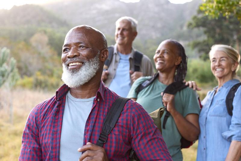 A group of seniors hiking together. 