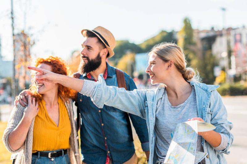 A group of people sightseeing and traveling. 