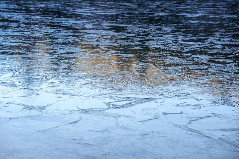 The surface of a frozen lake. 
