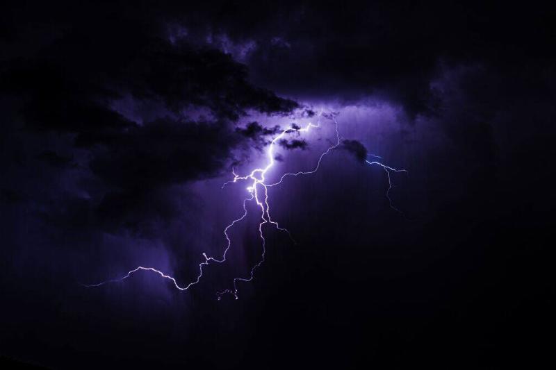 A lightning strike in dark clouds.