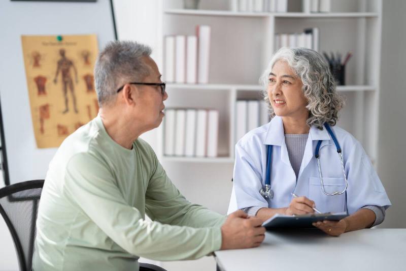 Senior man speaking with his doctor. 