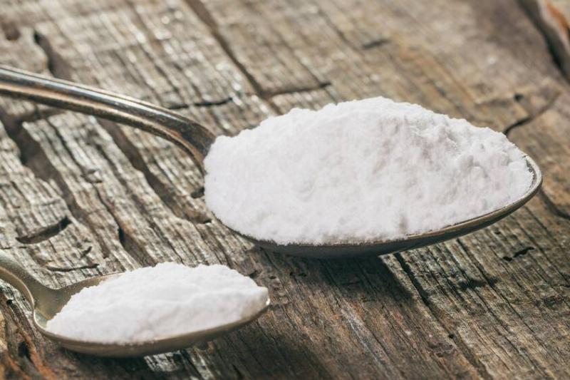 A tablespoon and teaspoon of baking soda. 