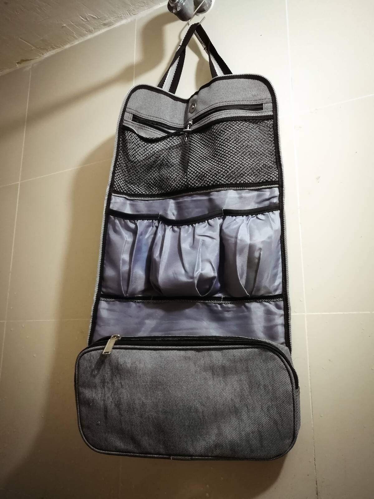 A hanging toiletry organizer. 