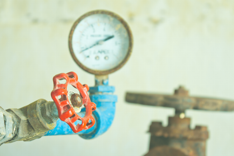 A pipe with a water shut-off valve. 