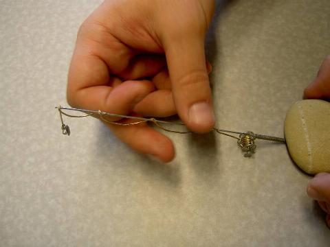 A fishing rod made from a paper clip. 