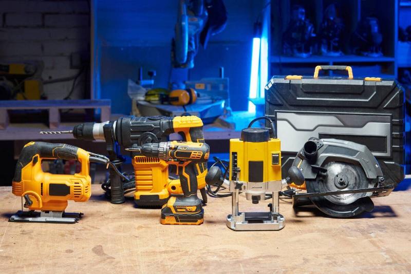 Set of power tools on a work bench.