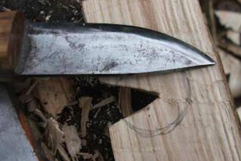 A knife near the notch. 