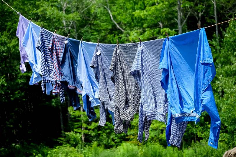 Clothes hanging from a clothesline. 