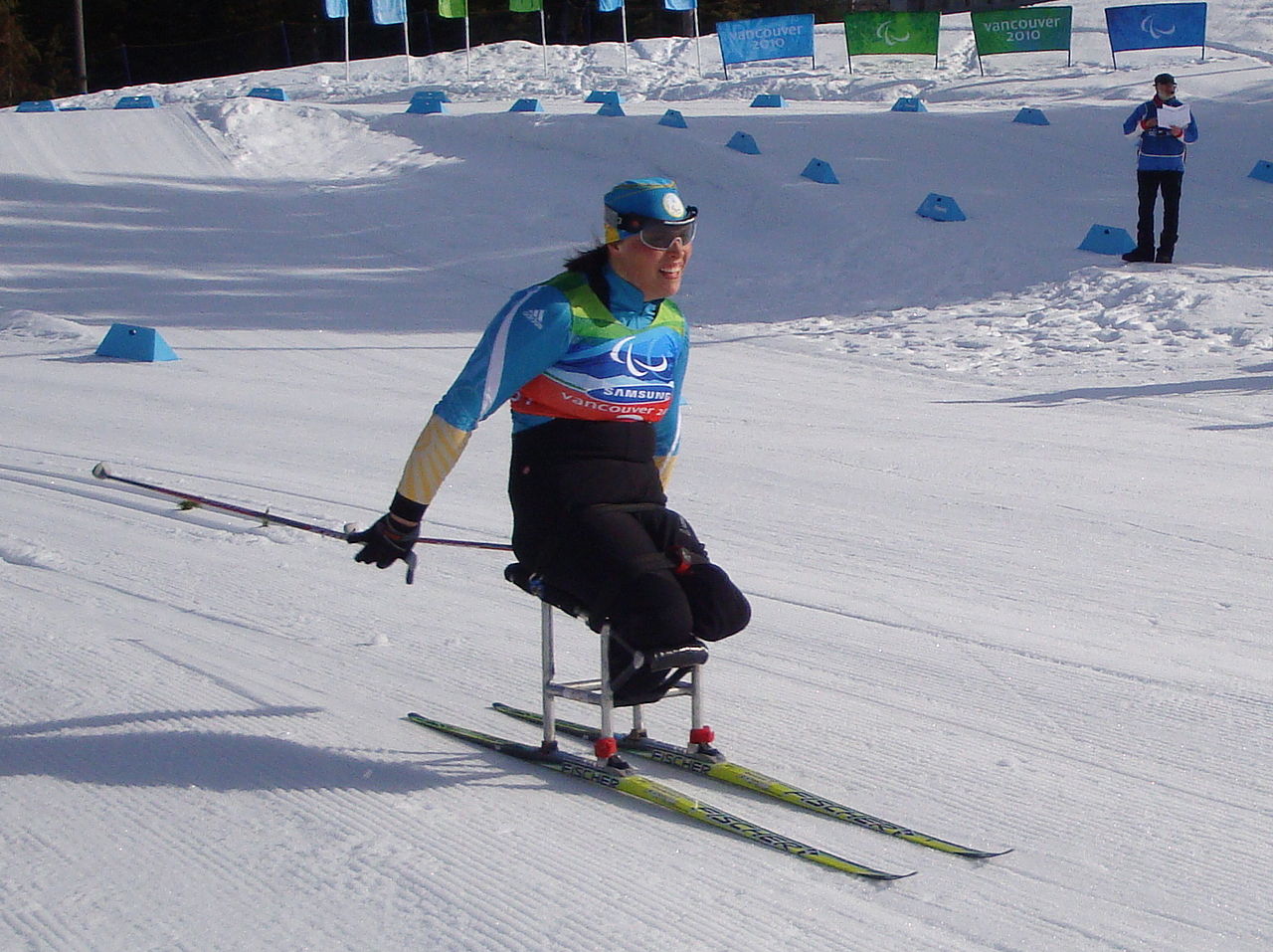 Olena Iurkovska of Ukraine competing on cross-country sit-skis at the 2010 Winter Paralympics