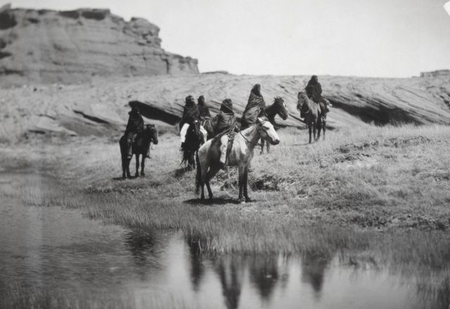 Six Navajo on horseback, ca. 1904