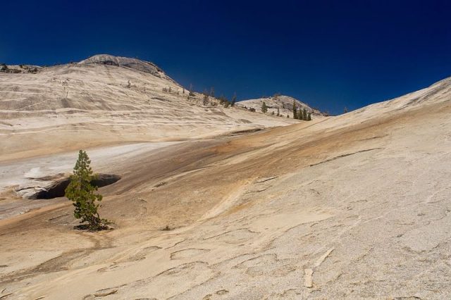 Yosemite glacially polished granite Photo Credit