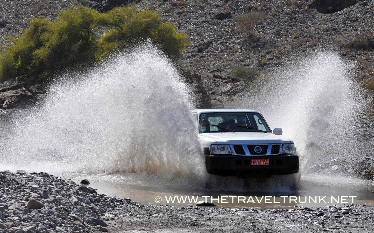 Driving tour through a not so dry river bed in Oman.
