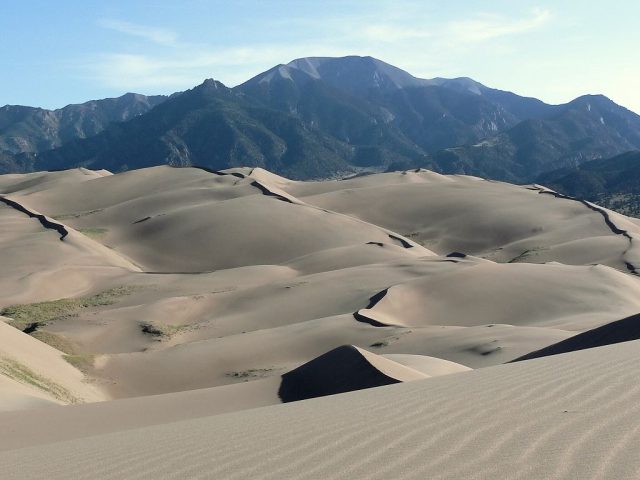 The massive and beautiful dunes that give this park its name. Photo Credit