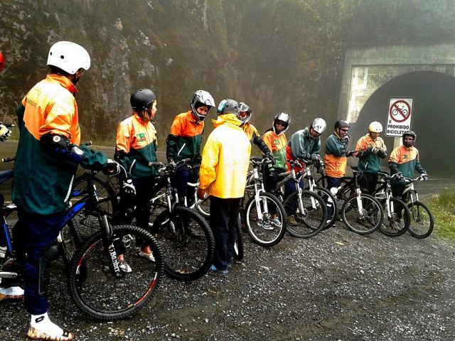 Travelers cycling the Yungas Road. Photo credit