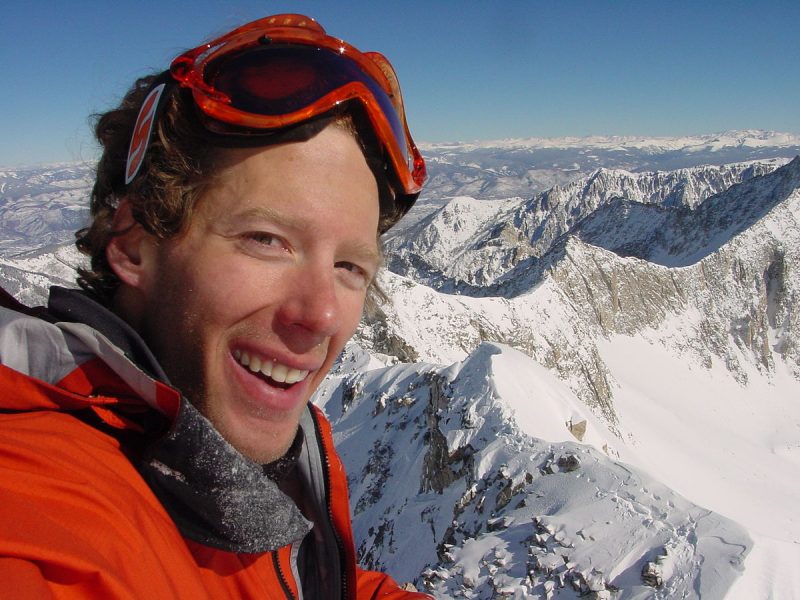 Self-portrait of American mountaineer Aron Ralston on the 14,137-foot-high summit of Capitol Peak, in Pitkin County, Colorado, USA, on February 7th, 2003 – Author: Aron Ralston – CC BY-SA 3.0