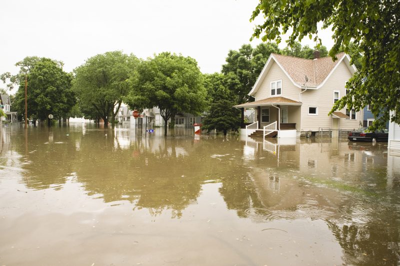 Water floods a neighborhood in the Midwest