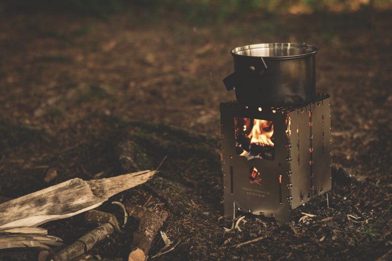 Camp or survival stoves are compact sources of heat that also emit light