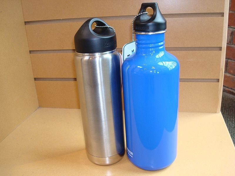 A stainless steel water bottle can be heated on the fire to boil your water