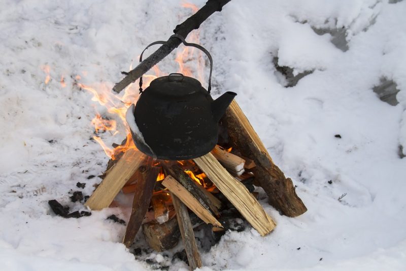 Making a fire in any weather will give you a source of heat, a way to cook food, boil water, and even a way to signal for help