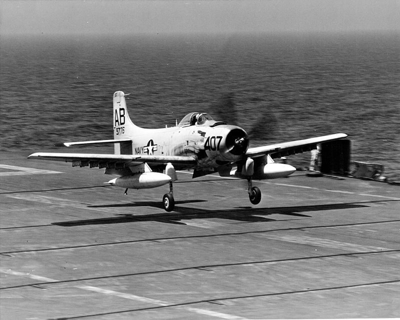 A Navy A-1 Skyraider from VA-15 catches a wire during carrier operations