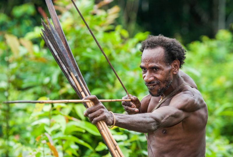 This tribesman in New Guinea, Indonesia is looking very focussed.