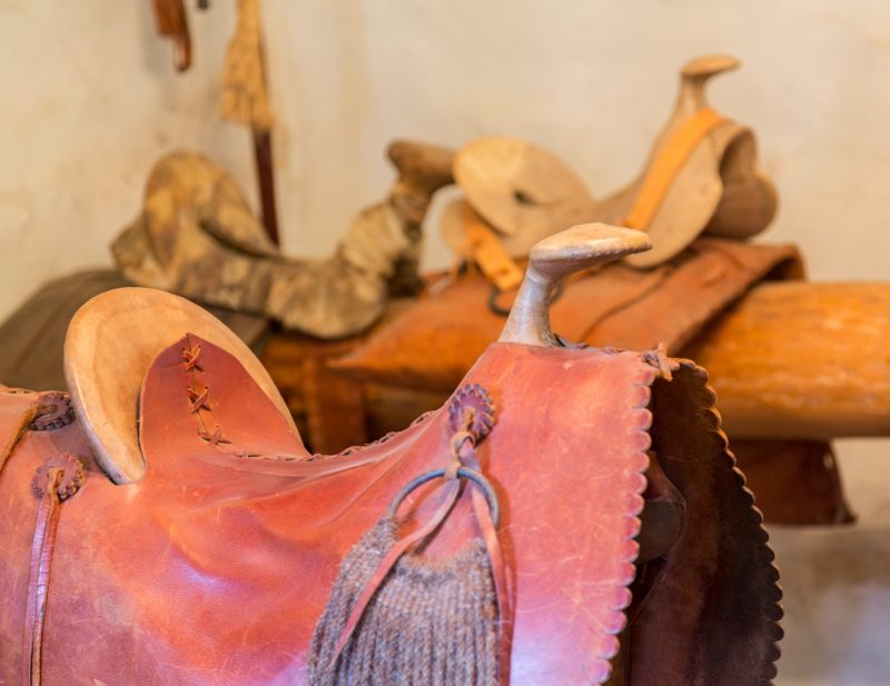 Hand-crafted leather saddles in La Purisima mission California.
