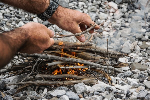 Every fire begins small. Use kindling at first and then work your way up to larger logs. In bad weather, however, you may be restricted to using smaller pieces of fuel for the duration of the fire.