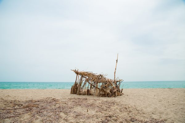 Shelters are critical in a desert environment, and even a crudely-built shelter like this will offer some protection from the sun and sand