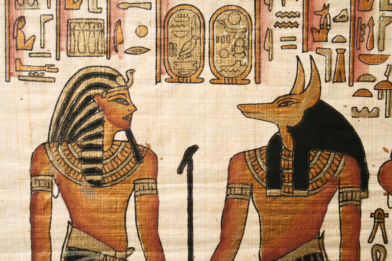 Representation of ancient gods over kind of papyrus paper