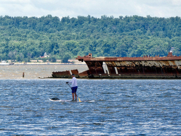 Board surfing alongside abandoned ship/